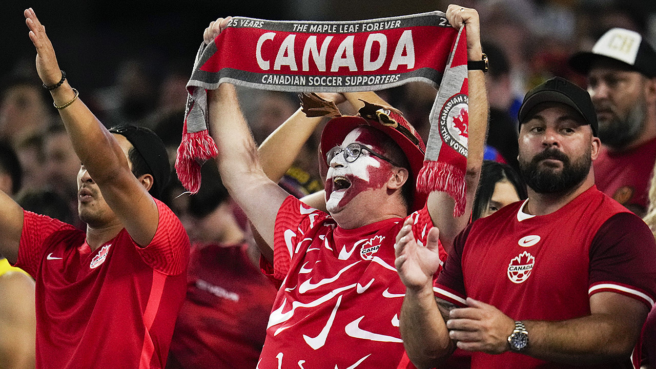 Canadian fans celebrating with Canada flags